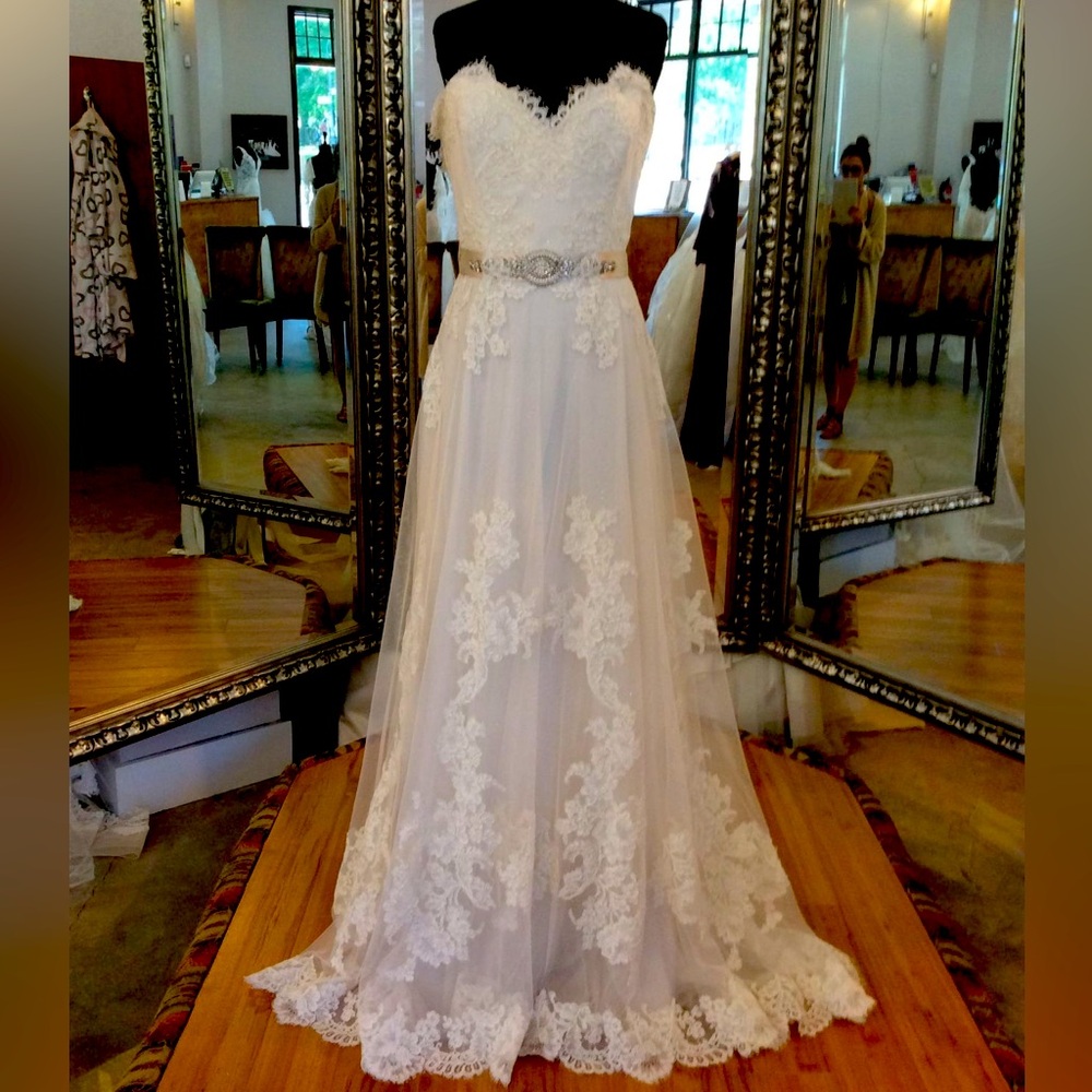 Lazaro Wedding Gown gently used. Veil included if interested at no cost